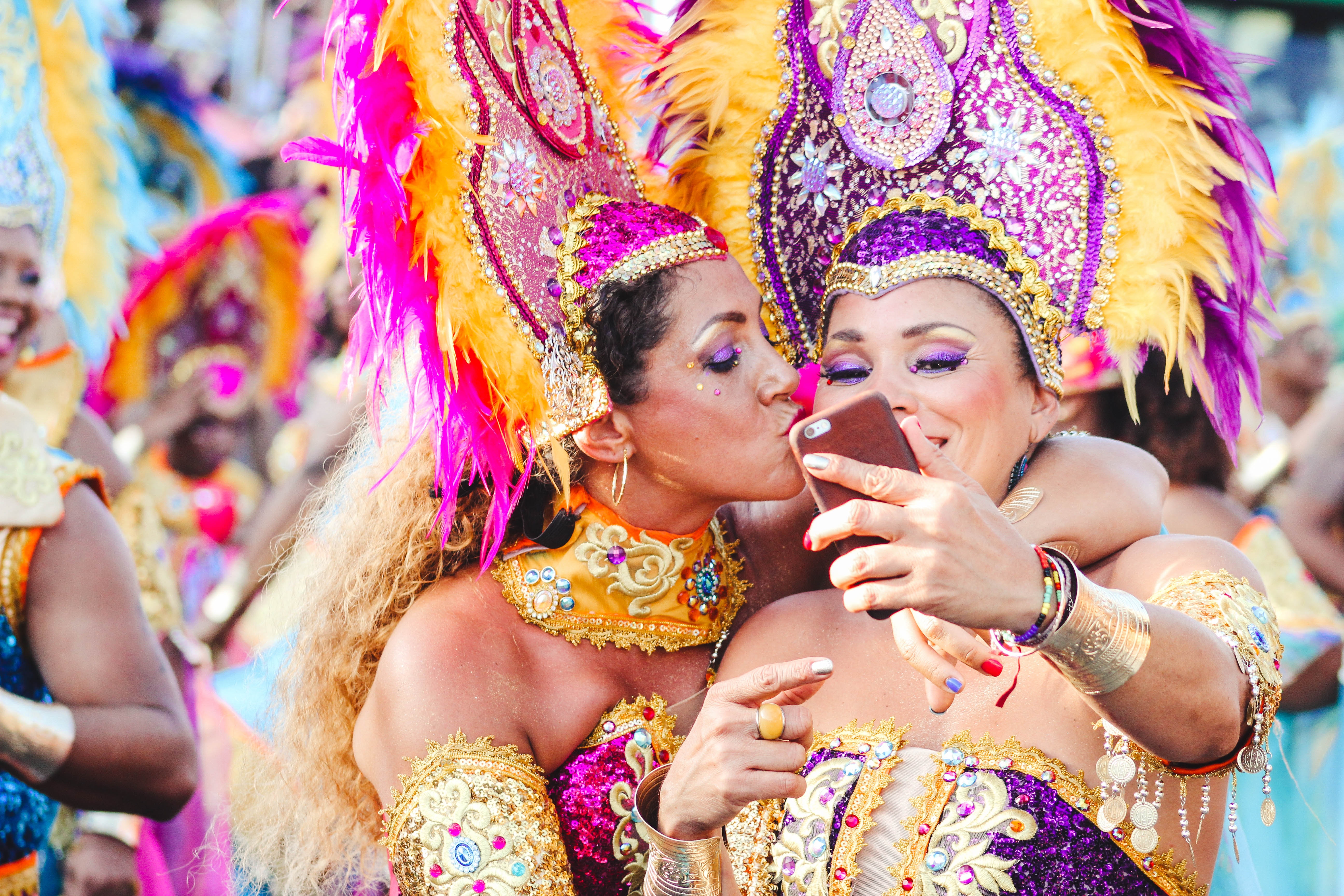 women at a festival posing for a photo