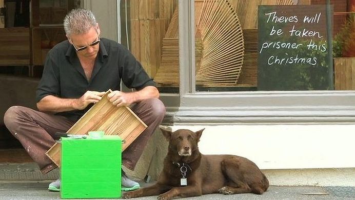 Michael Kelly working with wood