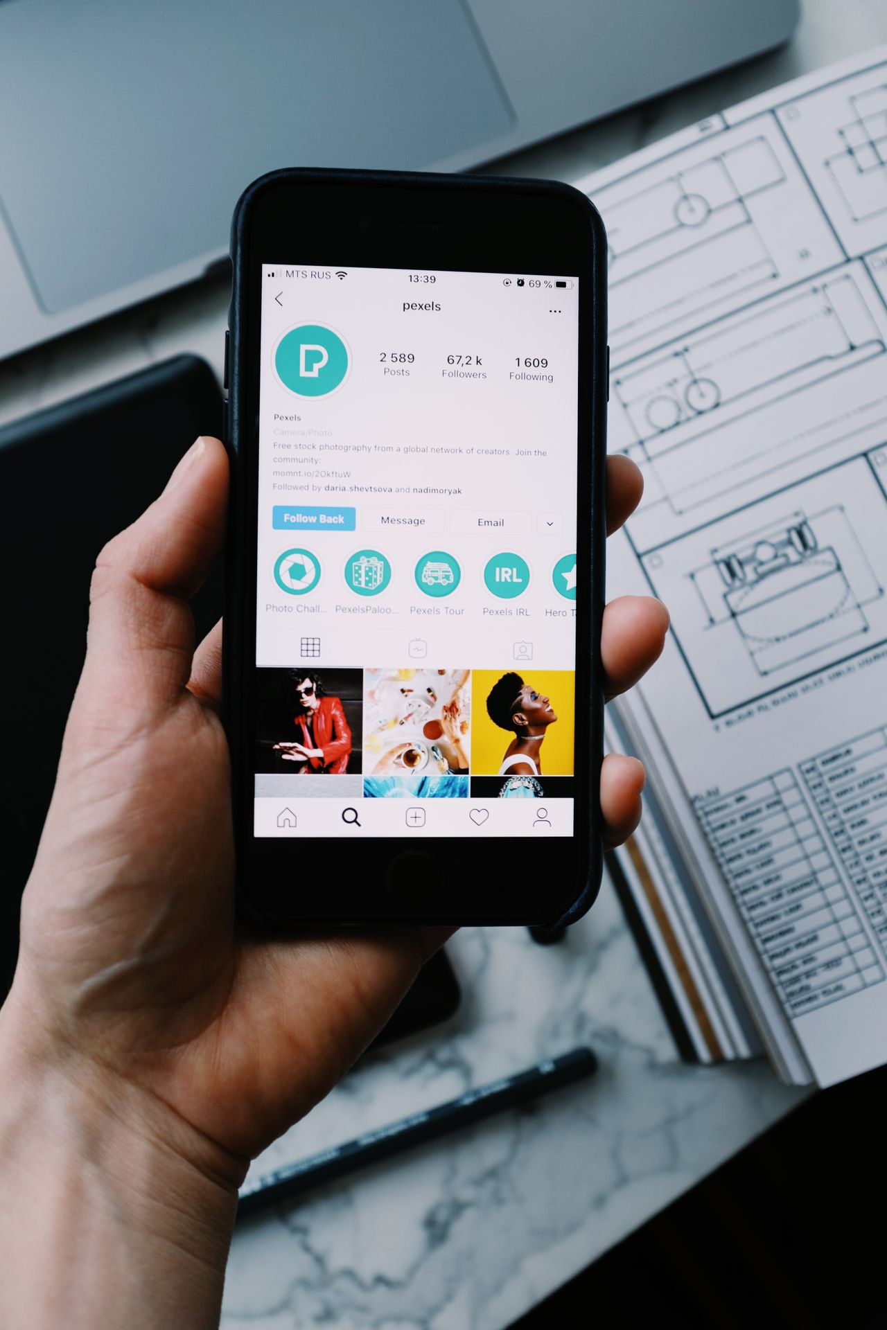 Person reviewing social media content on a smartphone