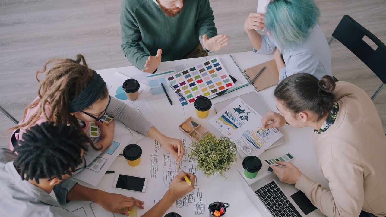 Creative team reviewing colour swatches and design concepts