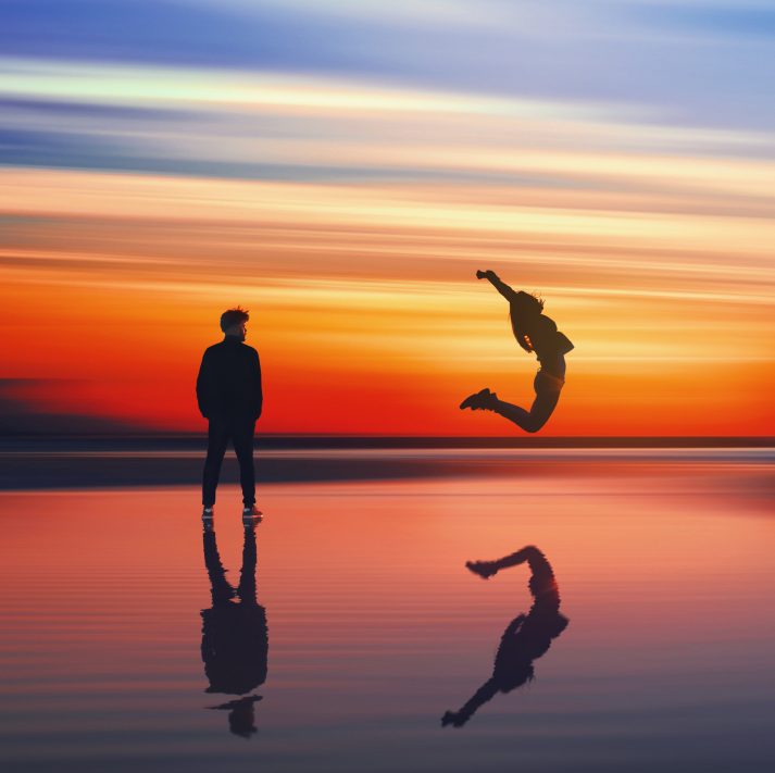 couple enjoying the serenity of the warm landscape