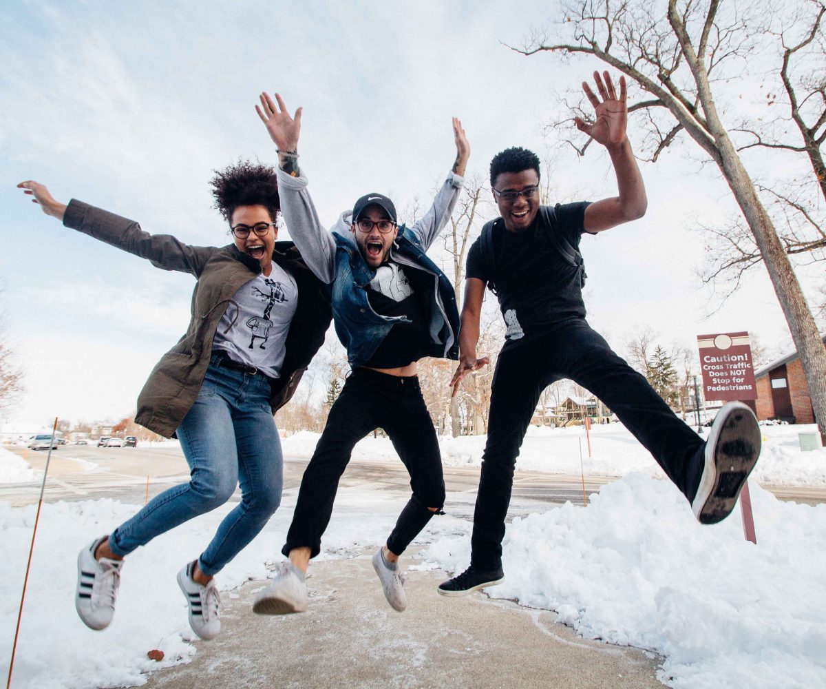 google ads remarketing team jumping in the snow