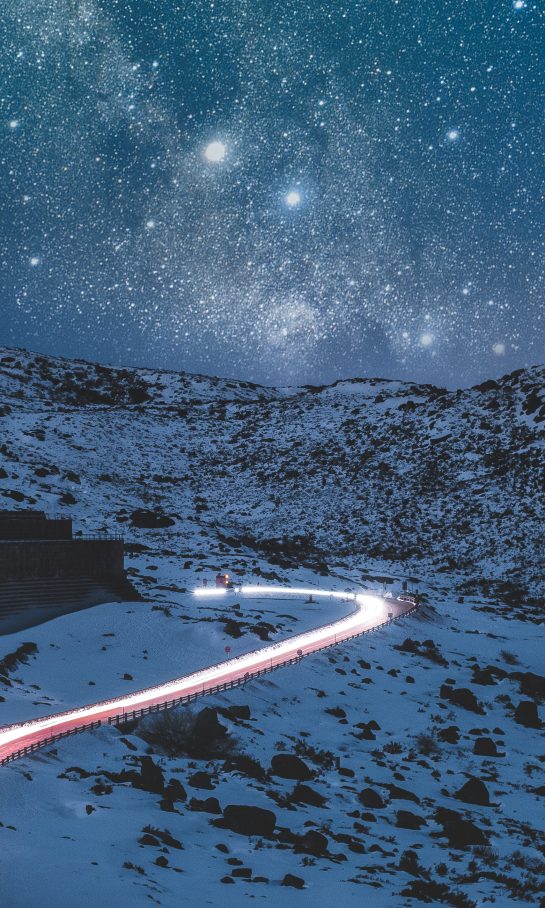 local seo with a lit up road by a snowy mountain